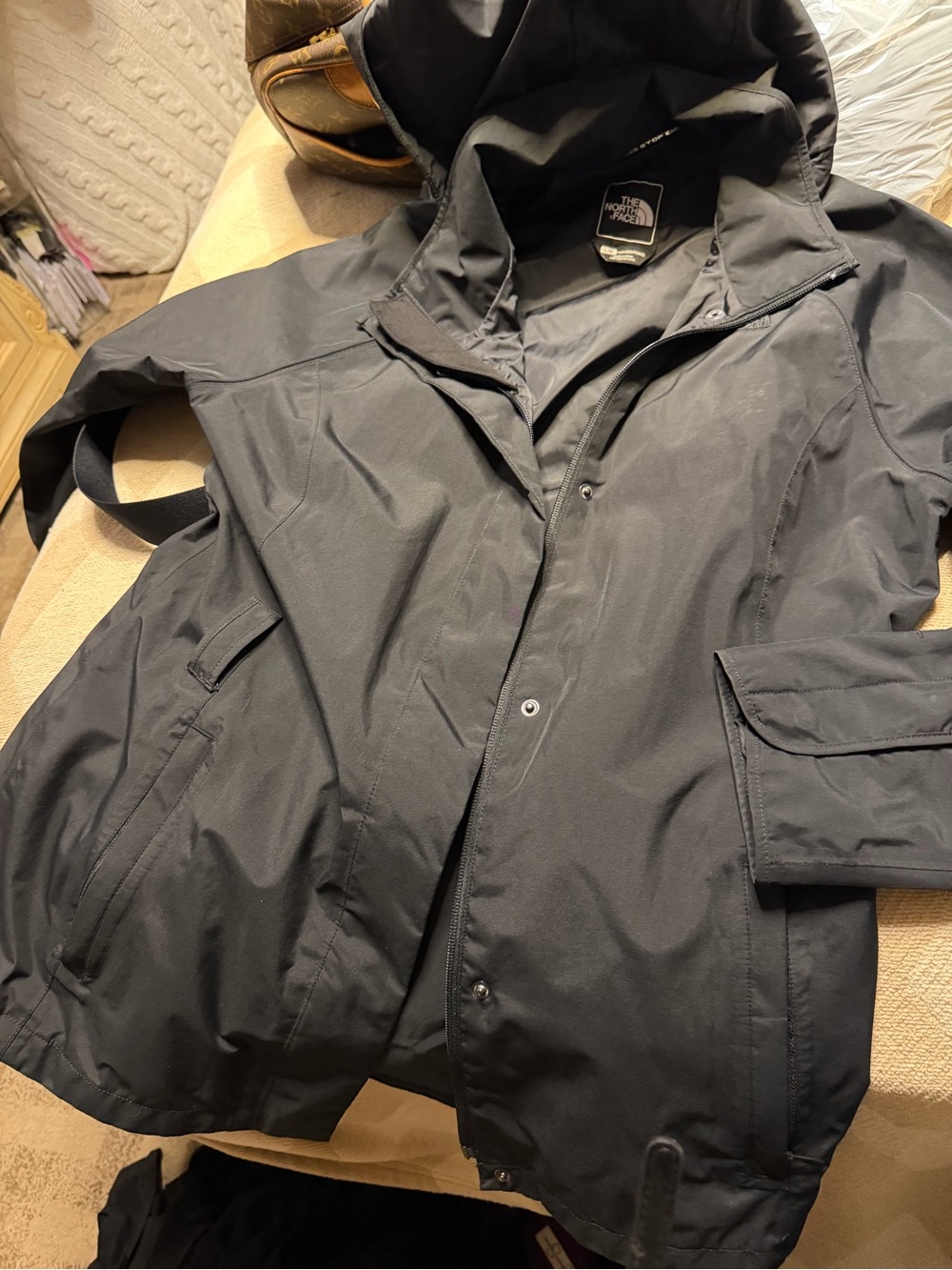 The North Face Black Hooded Raincoat with Snap & Zip Front